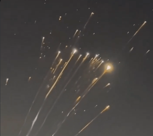 SpaceX Starship explosion debris resembling a meteor shower in the night sky